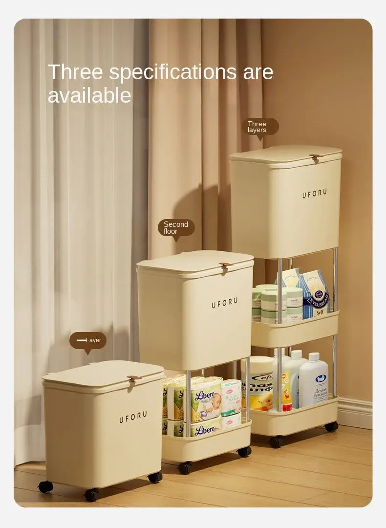 Cremefarbener Uforu-Dreistufen-Rollaufbewahrungswagen mit elegantem minimalistischen Design und schwarzen Rädern für Babyaufbewahrung und Abfallorganisation.