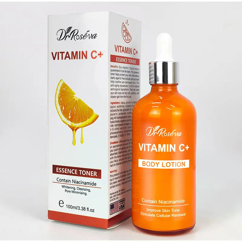 An orange glass bottle with a silver dropper cap and a white label reading dr in a vitamin c brightening skincare set.