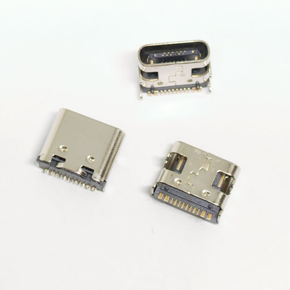 three metallic 16 pin smt socket charger usb type c connectors with sleek silver finish and gold-plated contacts for socket charger charging applications