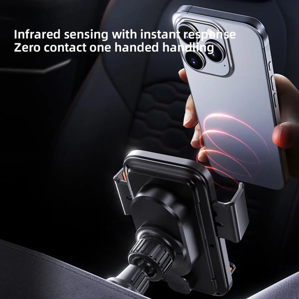 A silver iPhone with triple-camera system held above a black wireless car phone charger 15w mount showing the back side of the phone.