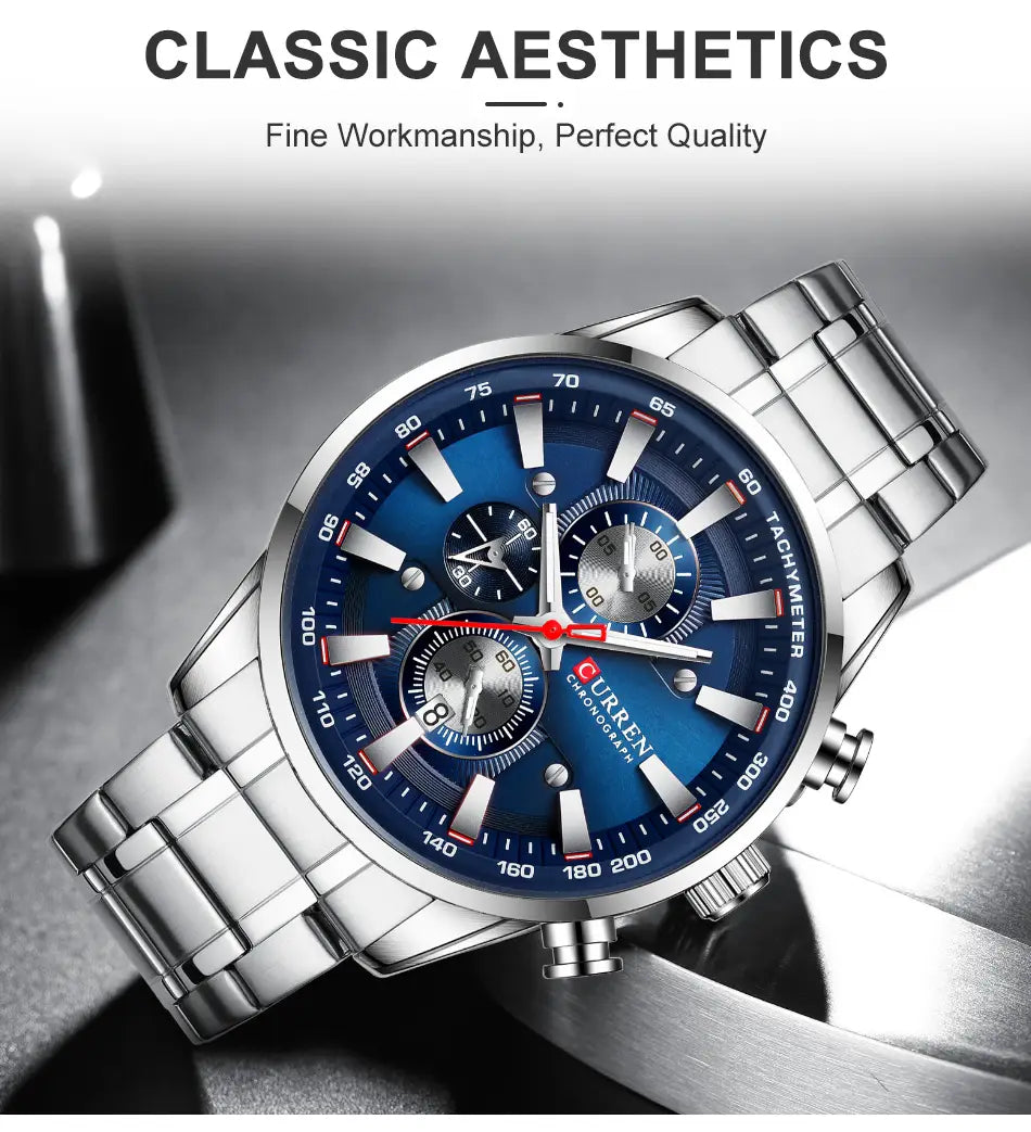 Curren mens chronograph stainless steel watch with a silver-toned case, vibrant blue dial, and white and red accents on the hands and markers featuring three sub-dials for timekeeping functions.