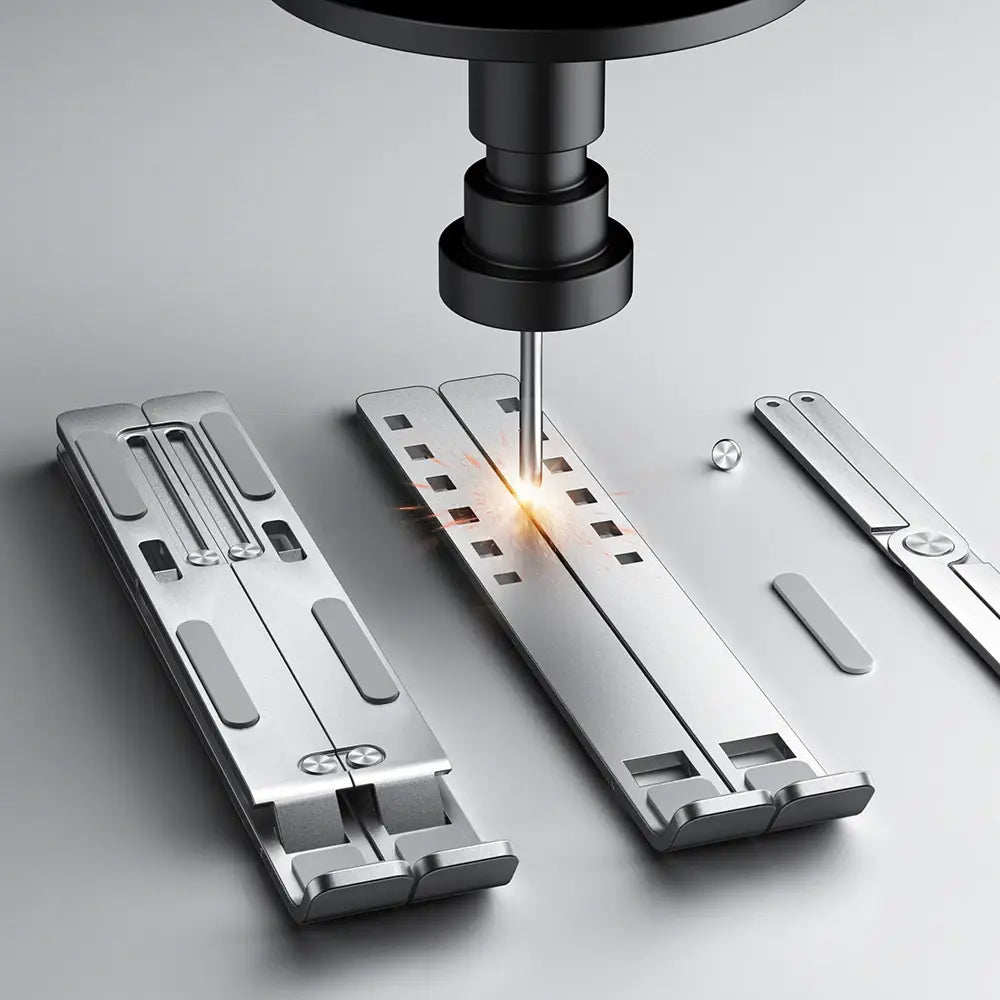 Silver metallic adjustable aluminum laptop stand with a sleek foldable design and precise ventilation cutouts ergonomic holder.