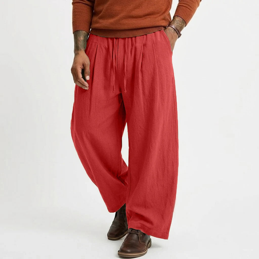 Pantalones casuales de lino para hombre color rojo, de corte holgado, con cintura ajustable mediante cordón y diseño de pierna recta, confeccionados en algodón y con mezcla de lino para un uso diario cómodo.