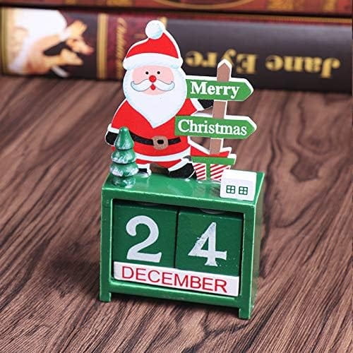 wooden christmas countdown calendar blocks featuring green plastic christmas calendar with santa claus figurine in red suit and white beard standing beside miniature tree and gift box on top of the date display.