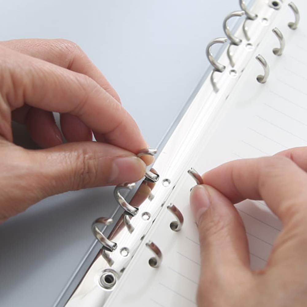 a5 translucent loose leaf ring binder notebook featuring a silver metal spiral ring binder with a sleek reflective finish