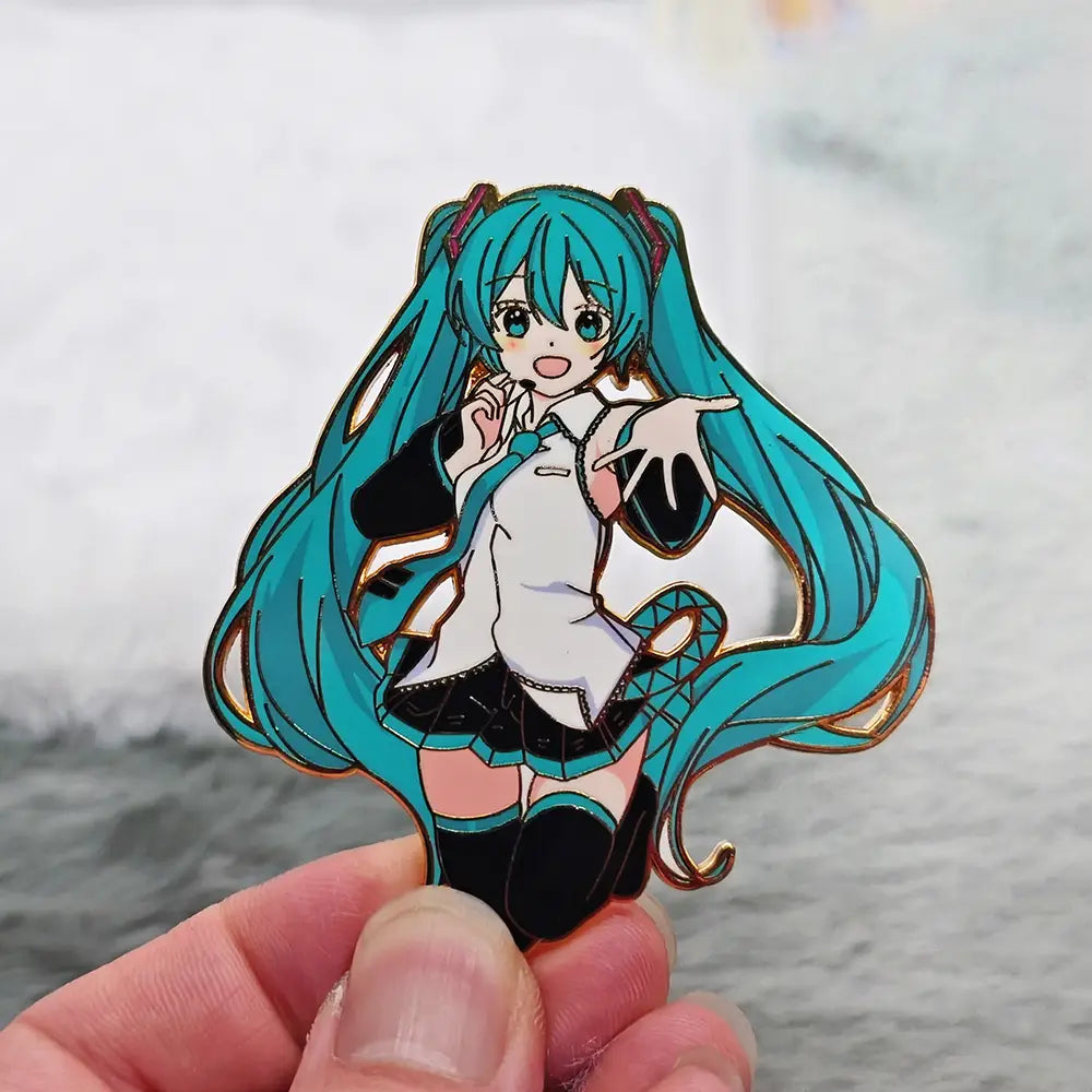 hatsune miku anime enamel pin featuring a turquoise-haired character with black and white outfit details made of metal badge.