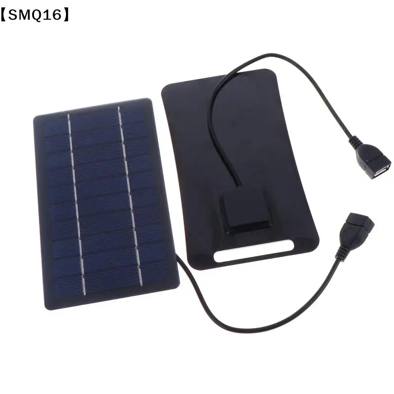 Black rectangular solar panel portable usb charging panel with two usb ports and built-in stand to stay connected on the go