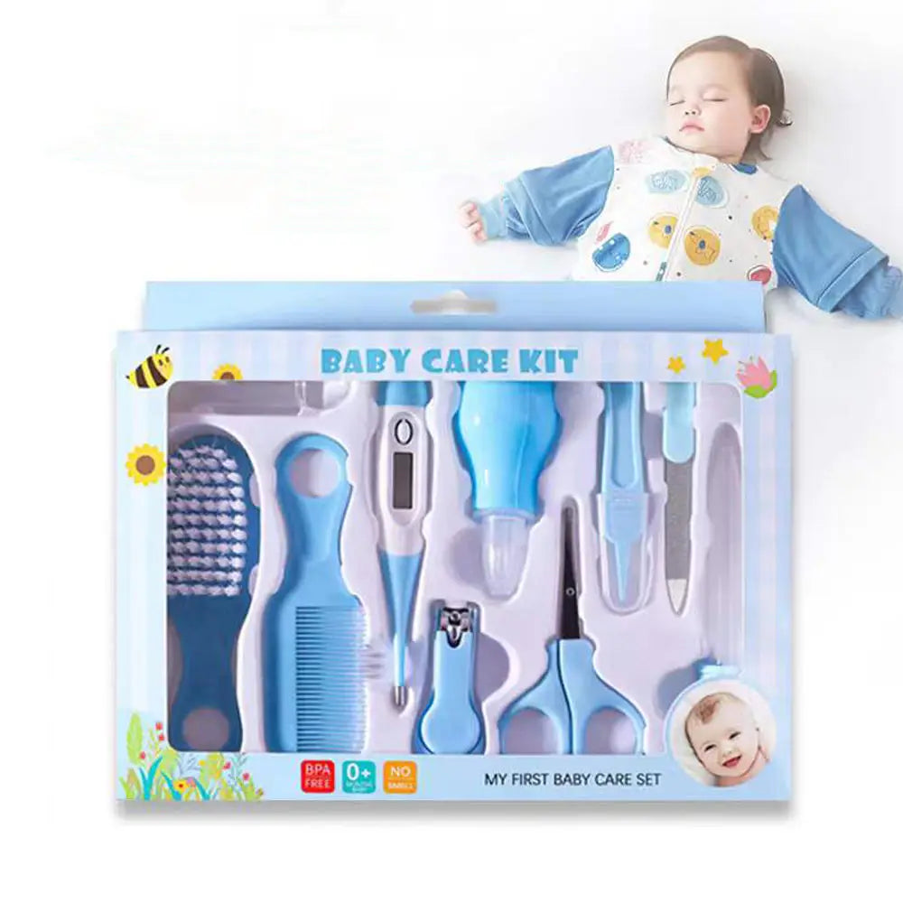 Blue plastic baby healthcare and grooming kit containing assorted baby care grooming and hygiene tools.