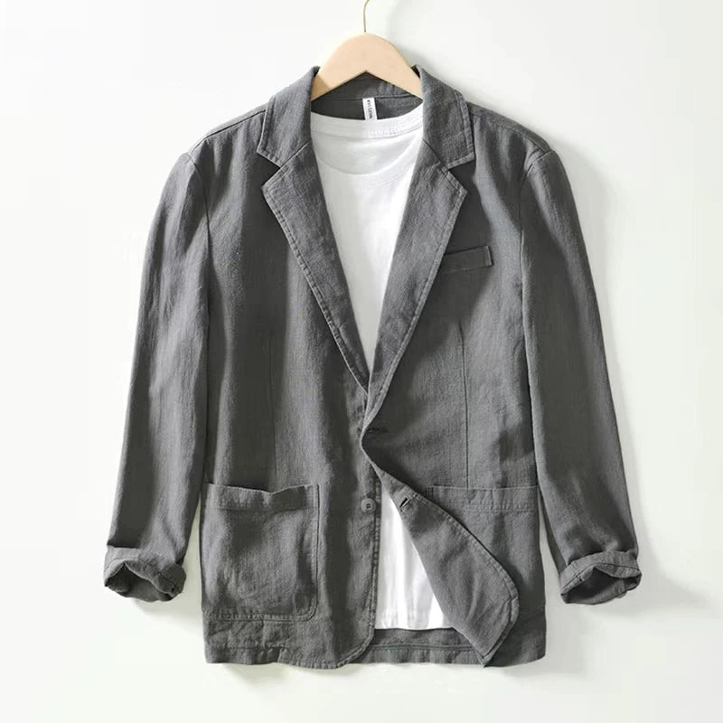 Dark gray cotton linen blazer with a single-breasted design and rolled-up sleeves for men casual retro style.