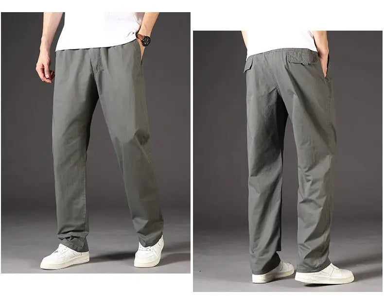 Men cargo pants cotton relaxed fit utility trousers in gray with a relaxed fit, multiple pockets, and a drawstring waistband.