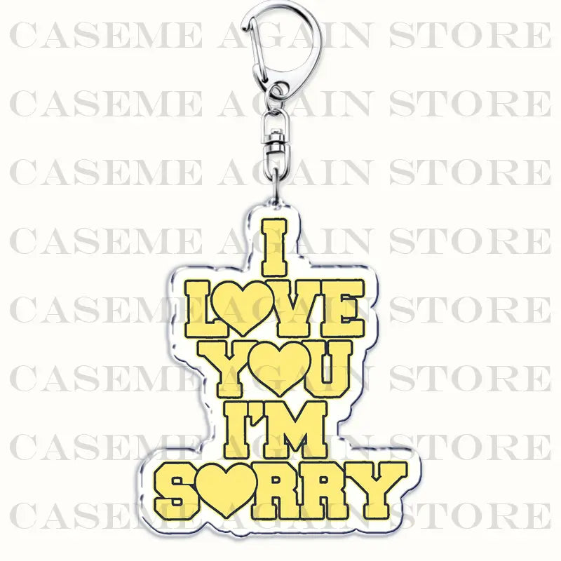 Yellow acrylic keychain featuring i love you im sorry text with heart symbols and a silver metal clasp from Gracie Abrams anime fan gift collection.
