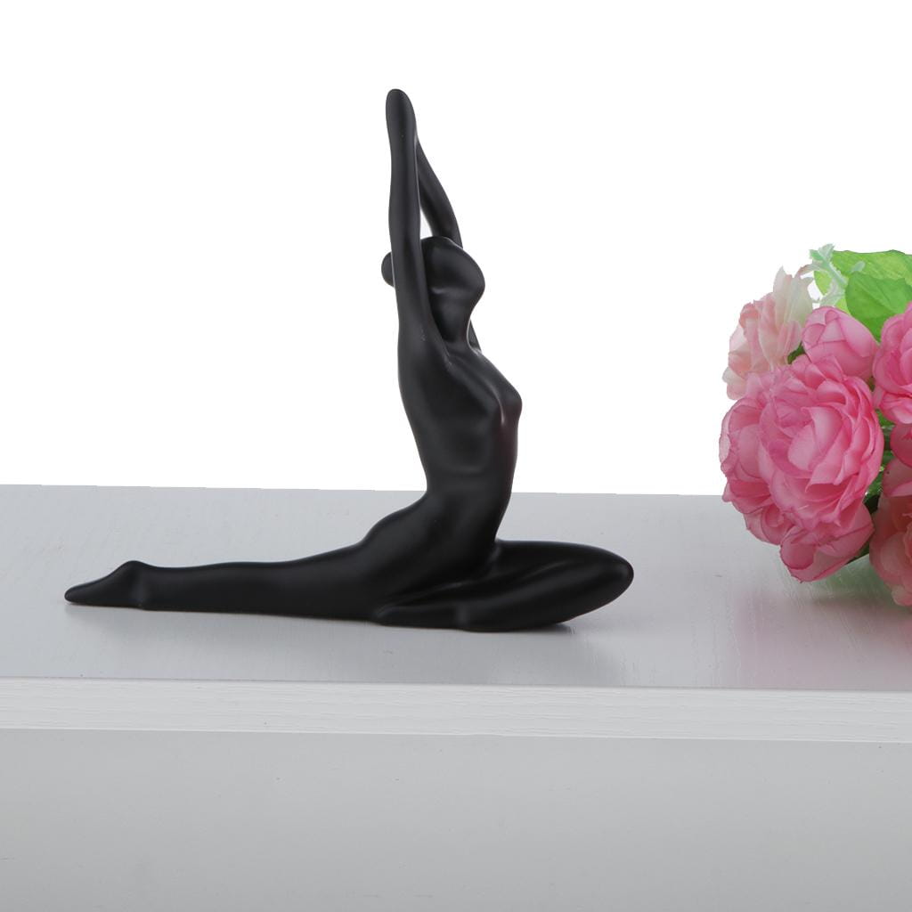 black glossy resin figurine of a woman in a yoga pose from the glossy resin yoga figurine set