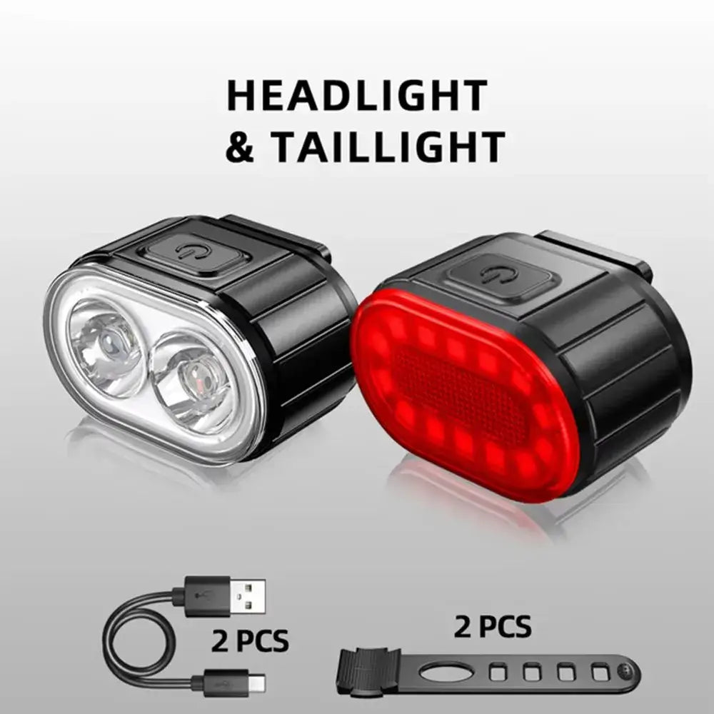 black usb rechargeable led bicycle light set with a white front light featuring two led bulbs and a red rear light with multiple leds