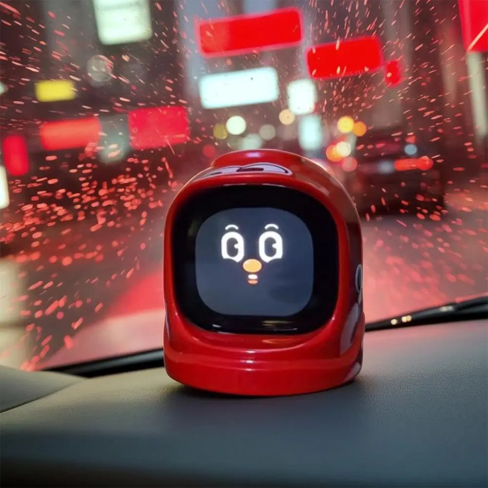タッチスクリーンと、にっこりした顔を表示する赤い艶のあるプラスチック製電子ペットロボットで、効果音が流れる。