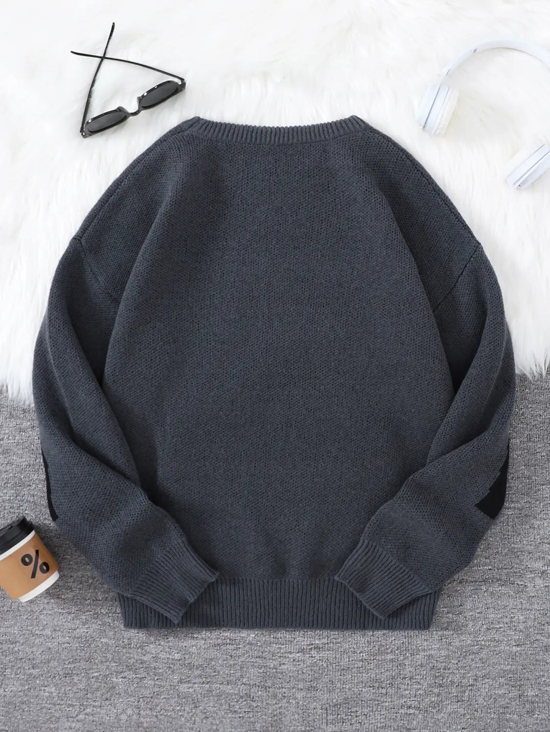 Men black amazing graphic knit sweater in dark gray oversized knit with ribbed cuffs and hem.