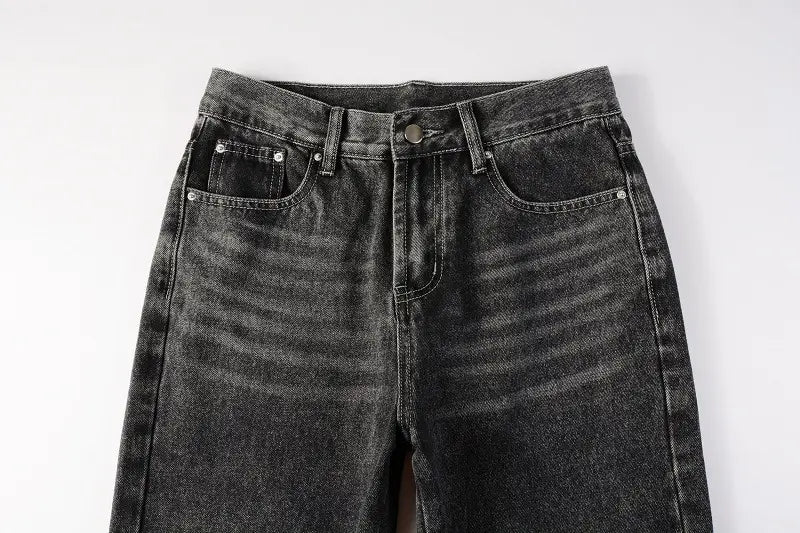Men flare jeans distressed dark gray denim trousers featuring dark-wash denim with a slightly faded textured appearance and classic five-pocket design.
