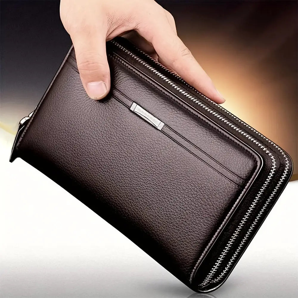 Portefeuille long pour homme en cuir brun foncé, porte-cartes, fermeture à glissière en argent, attache métallique et poche intérieure à emplacement, pour un rangement organisé.