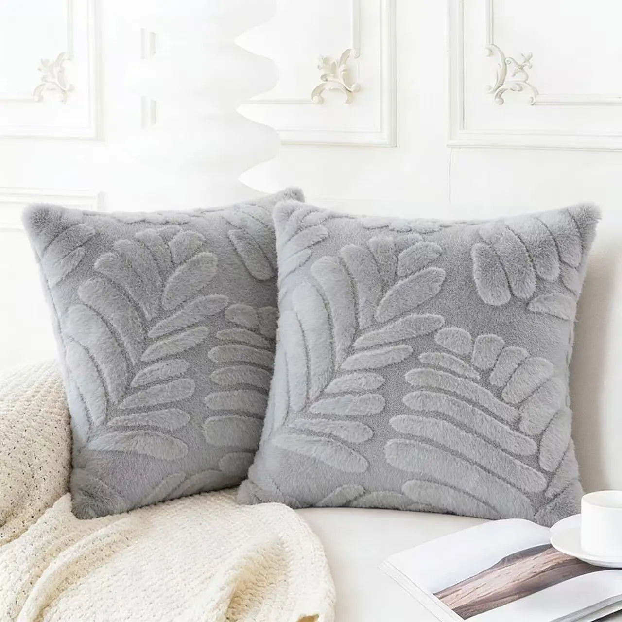Soft gray plush leaf embroidered throw pillow covers featuring raised leaf patterns in faux fur material.