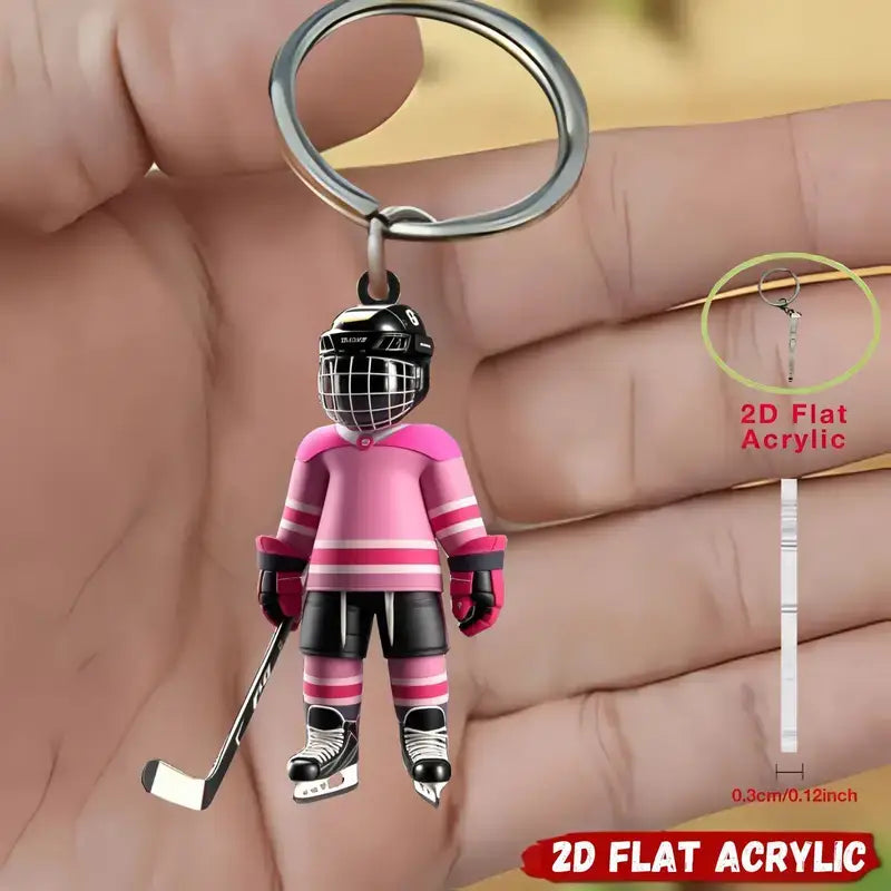Pink and black 2d flat acrylic hockey goalie keychain designed as a sports backpack charm