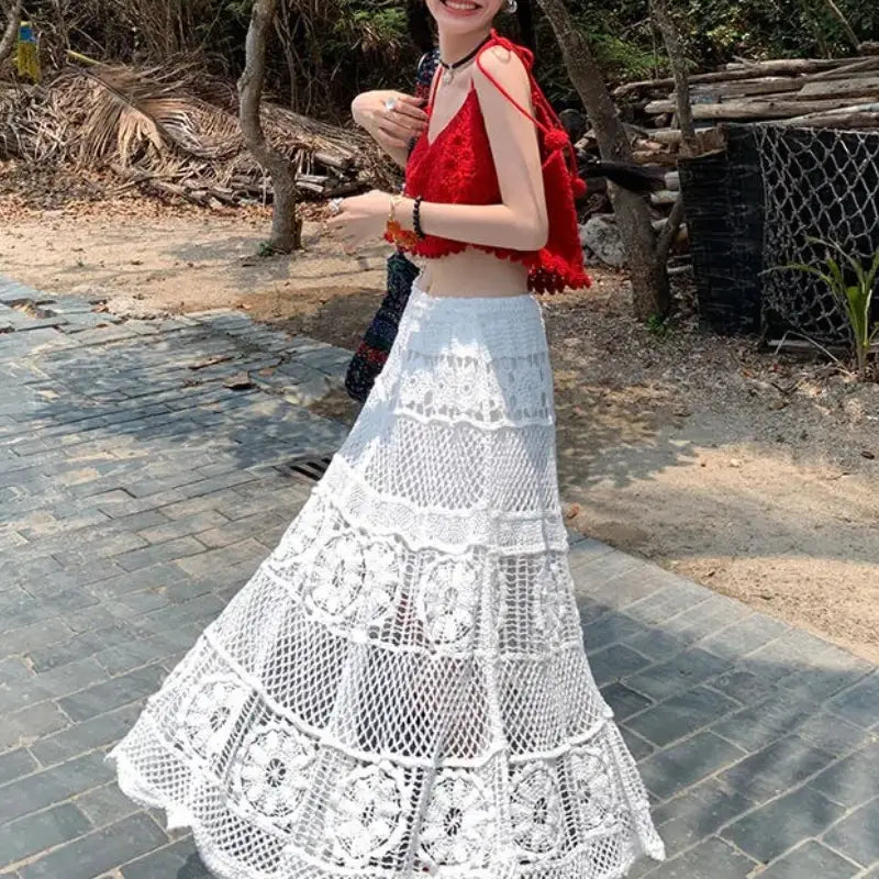 off-white crochet lace maxi skirt featuring tiered floral patterns ideal for summer wear