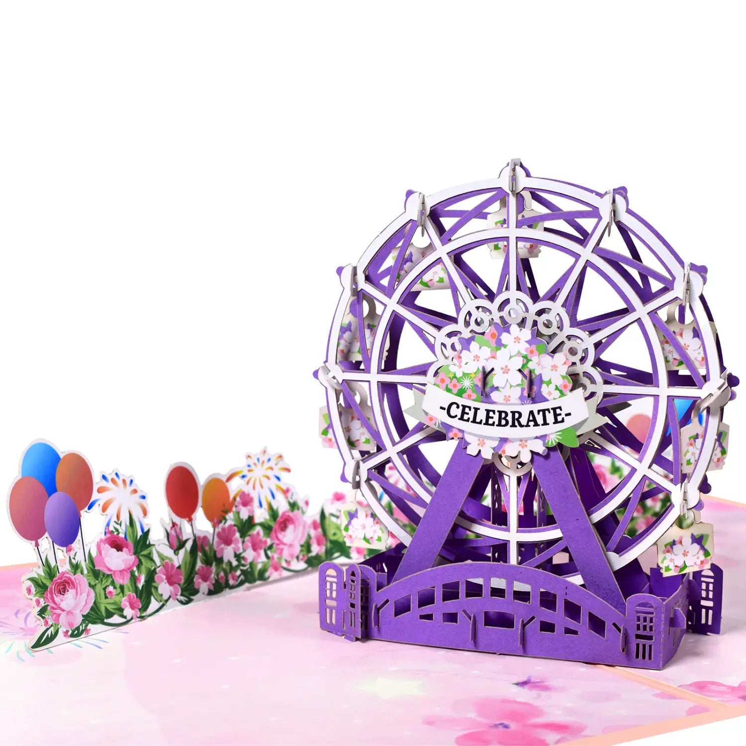 Carte de la Saint-Valentin 3D à effet pop-up en papier découpé violet, présentant une grande roue détaillée avec des décorations florales et une bannière « celebrate » pour un ensemble de salutations romantiques en couple.