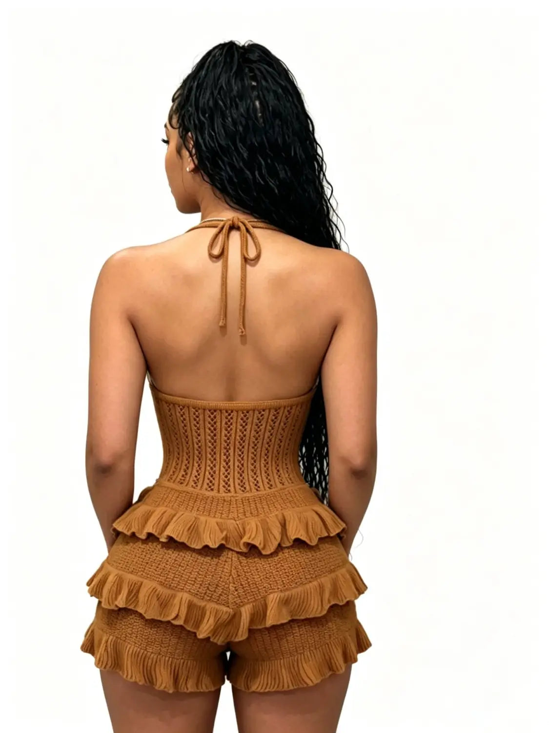 A tan knitted ruffle halter romper featuring layered ruffles and a tied-back neckband perfect for summer playsuit wear.
