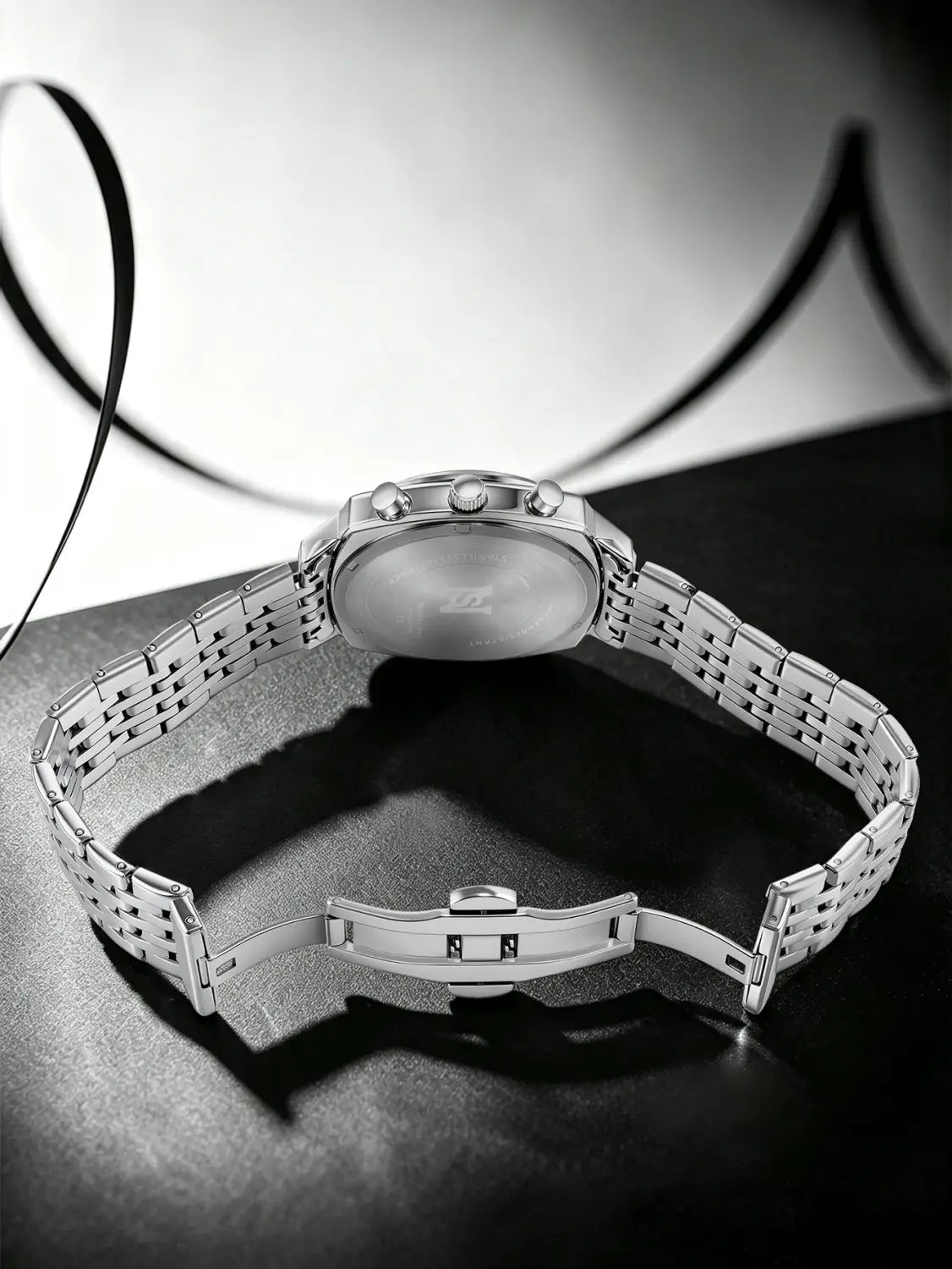 men’s stainless steel chronograph watch with a silver-toned polished case and a sleek interlocking link bracelet
