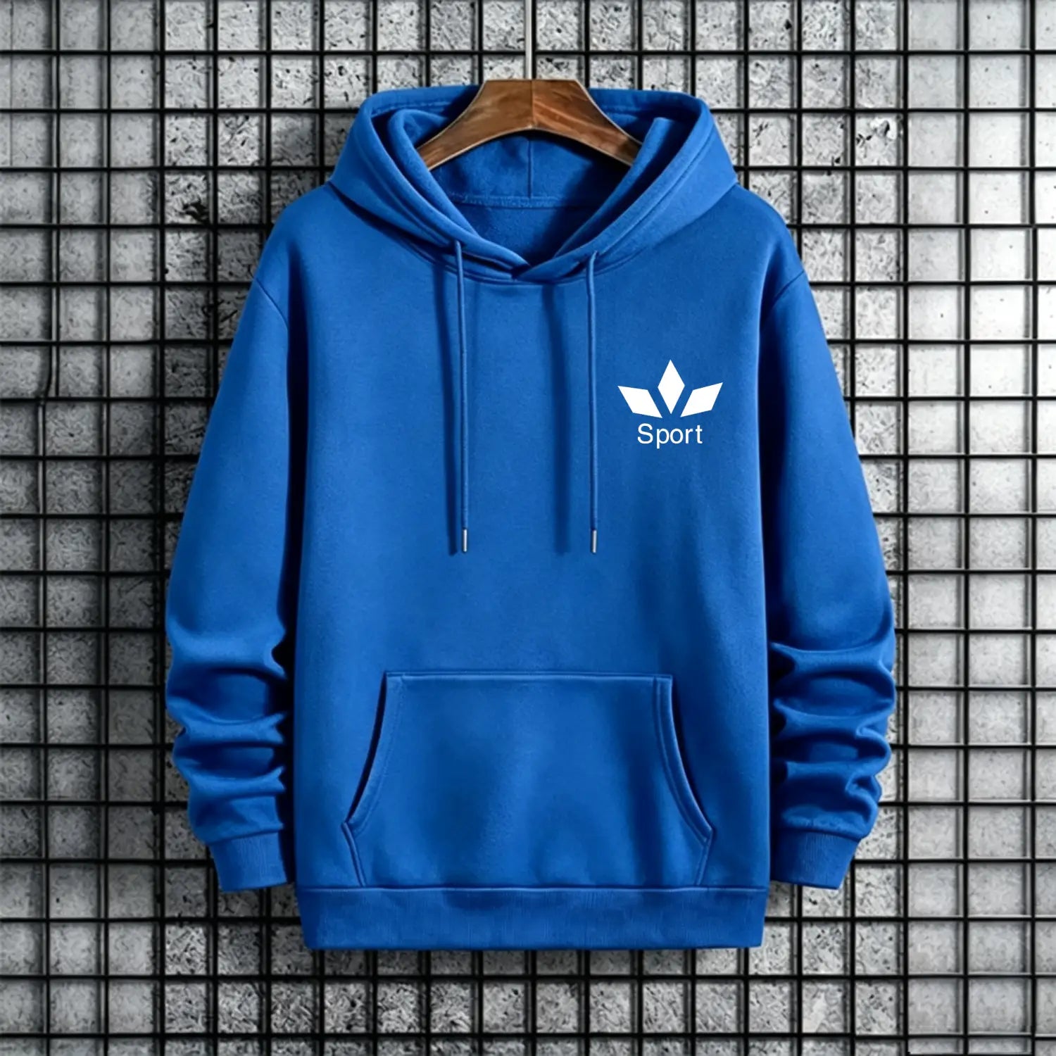 A vibrant royal blue men activewear pullover hoodie sweatshirt with a white adidas-style trefoil logo and sport text on the chest hanging on a wooden hanger.