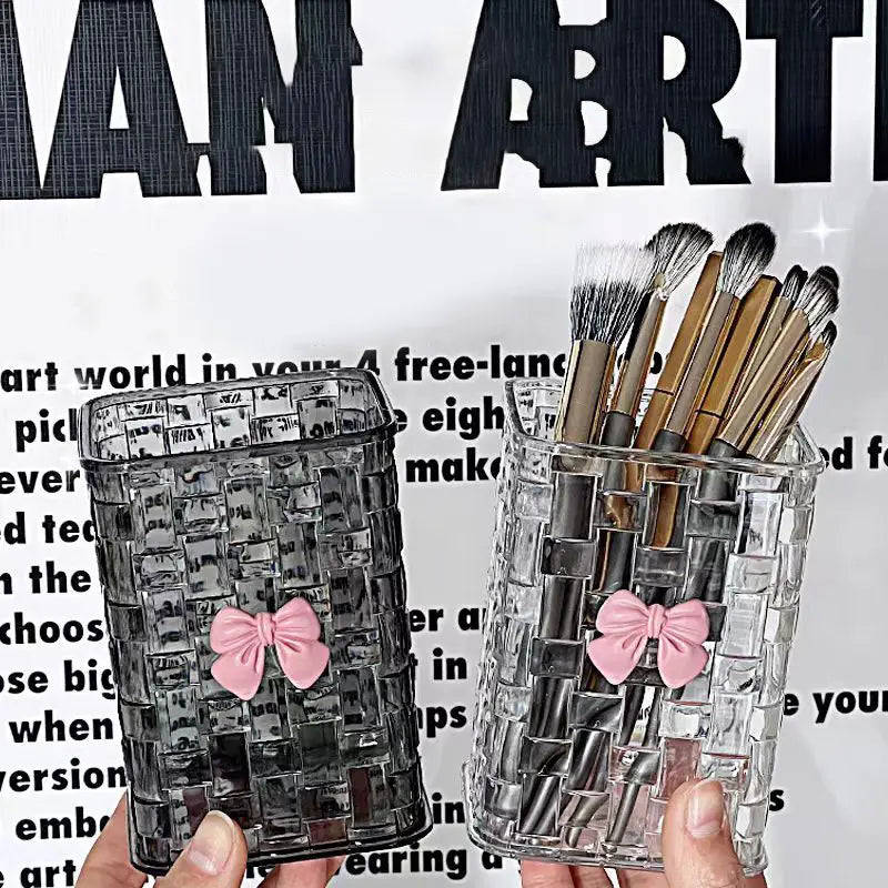 Two transparent mosaic brush holders with pink bows displayed as bow pen holder desktop storage organizers.