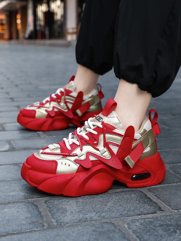 Men chunky air cushion casual sneakers in red and gold featuring bold sculpted straps and a thick rubber sole.