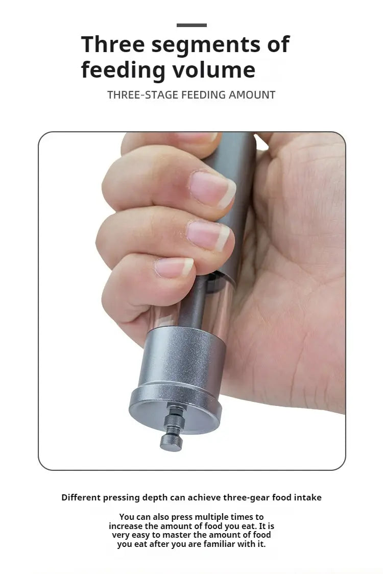 Silver metallic feeder mini aquarium accessory featuring a three-stage feeding volume design for small fish food dispensing.