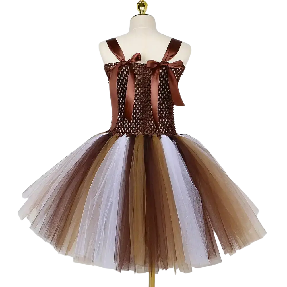 Vestido de tul tipo falda con volantes escalonados para niña pequeña con temática de león-jungla, en marrón y blanco, en capas, con corsé de malla y lazos de cinta de satén, visto desde el frente.