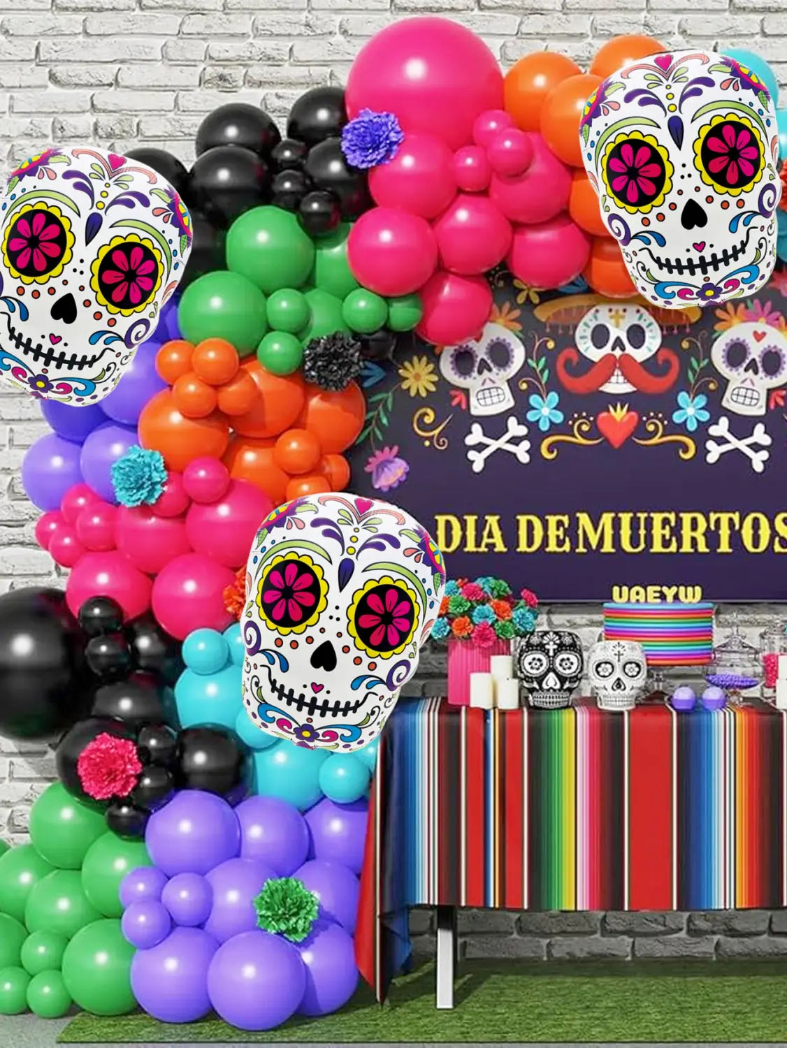 vibrant multicolored balloon arch featuring colorful flower skull foil balloons in white with pink and purple floral patterns