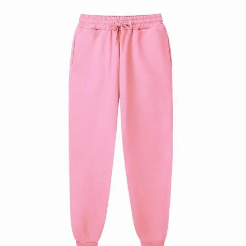 Pantalones de chándal de forro polar para hombre casuales de invierno en color rosa, con cintura elástica y cordón a juego, diseñados para mayor comodidad y abrigo.