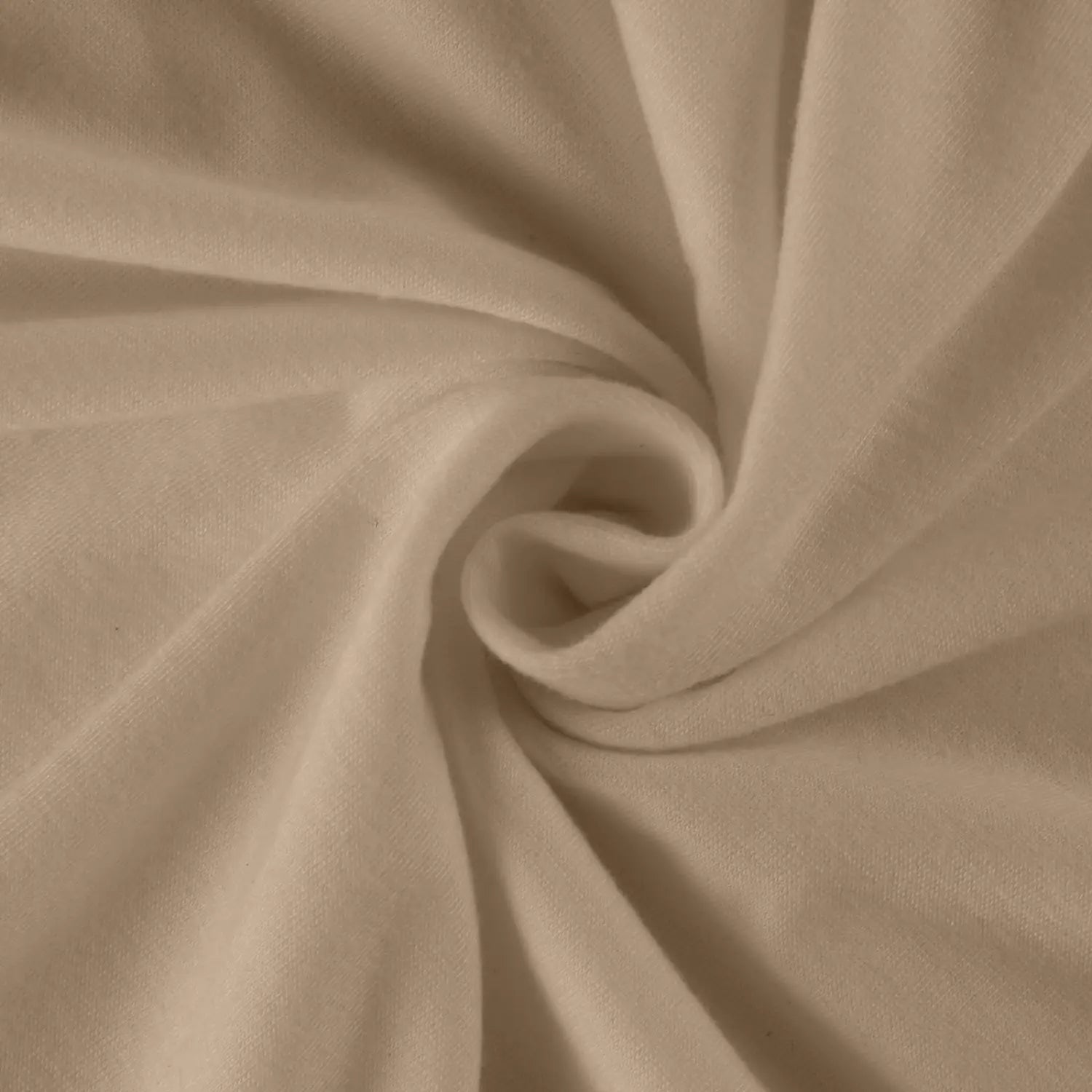 Beige soft fleece fabric with a gentle swirling pattern type on a women long sleeve cotton tunic top with long sleeve length.