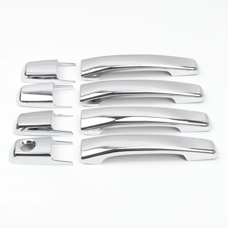 Lot de quatre caches de poignées de porte de voiture finition chrome, au design moderne élégant pour les modèles Mitsubishi Pajero de 2007 à 2021.