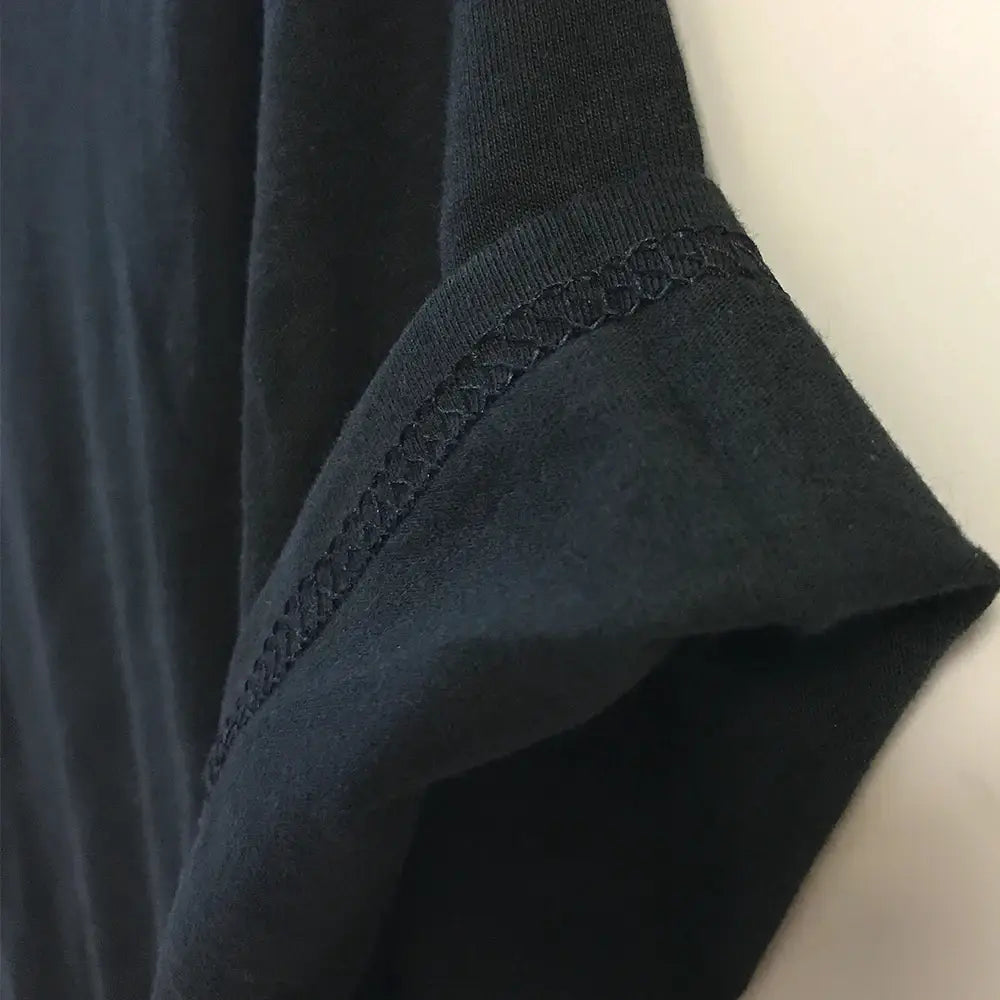 Black ribbed knit sleeve with decorative zigzag stitch along the cuff on attack on titan Levi Ackerman men graphic t shirt.