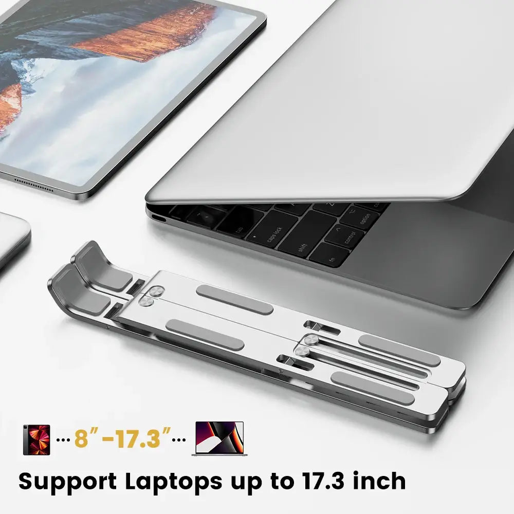 Silver aluminum adjustable aluminum laptop stand with multiple slots for secure ergonomic support.