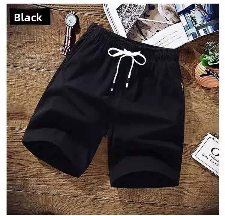 Herren-Leinen-Boxer-Slips in Schwarz mit weißem Kordelzug und elastischem Bund, entworfen für lässige, lockere Sommer-Strandbekleidung.