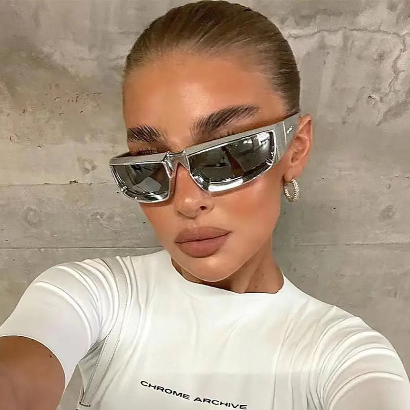 silver-framed angular sunglasses with reflective lenses designed as cycling glasses for sports and outdoor driving use