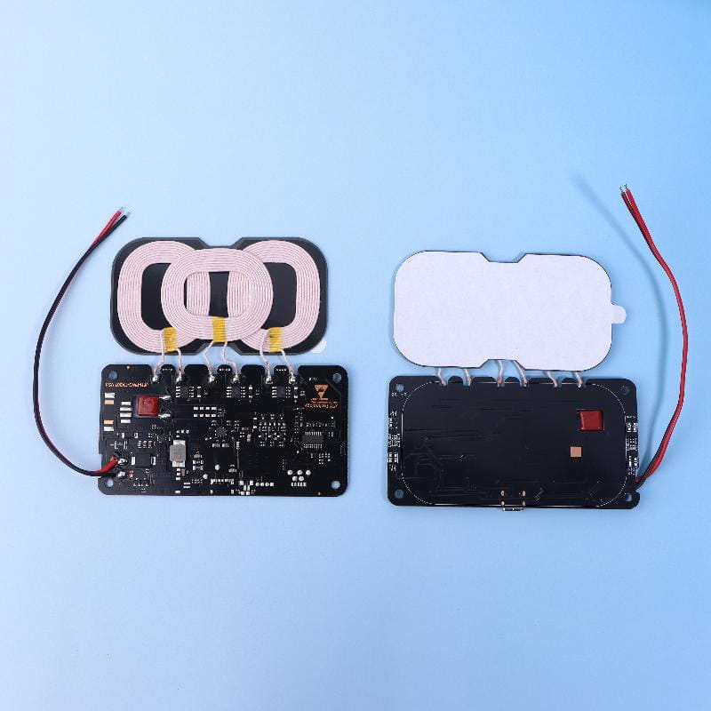 Wireless charging coil modules with black circuit boards and white coils for 20w wireless charger module for car and home use.