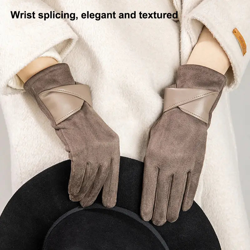 Brown suede women’s touchscreen winter gloves with a beige leather crossband at the wrist shown from the back side.
