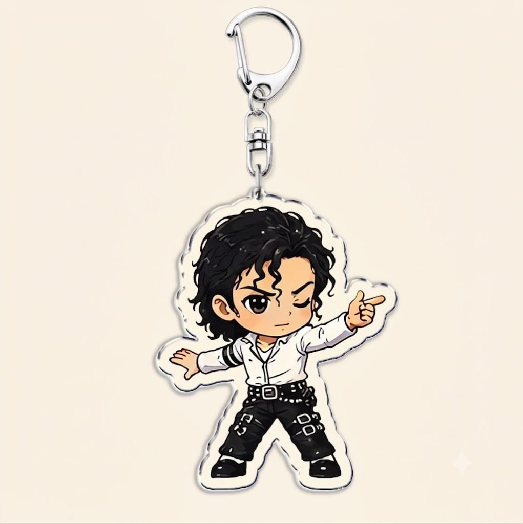 Michael Jackson chibi acrylic keychain featuring a cartoon depiction of Michael Jackson in his iconic white shirt and black pants with silver buckles attached to a metallic carabiner.