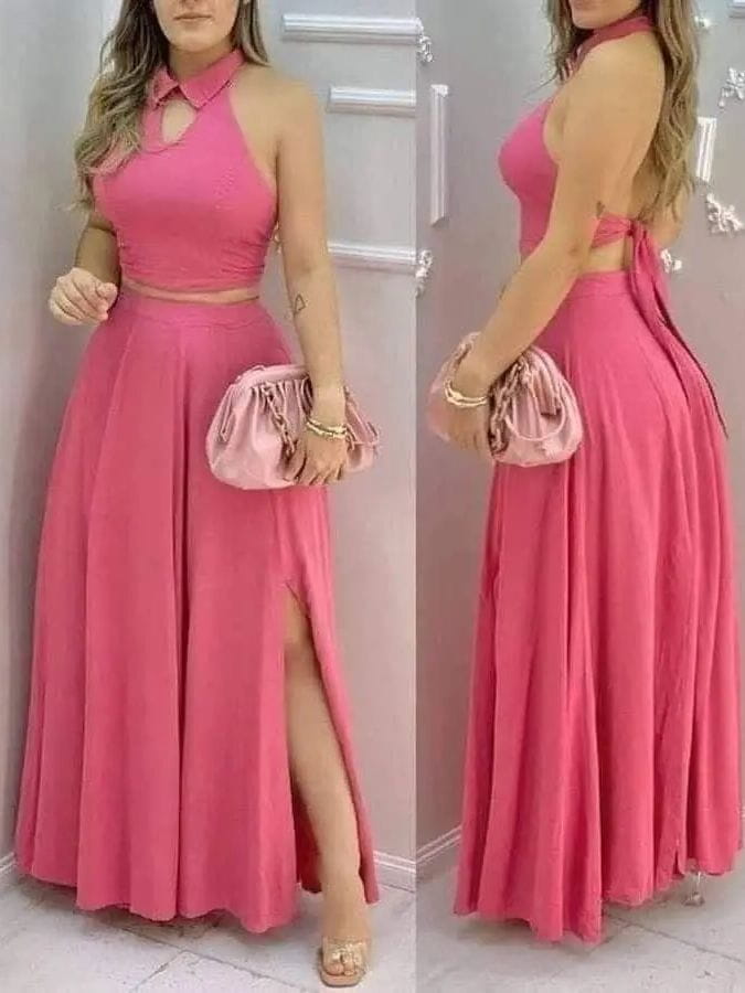 pink satin clutch with drawstring closure and gold tone hardware complementing a pink halter two piece set maxi skirt
