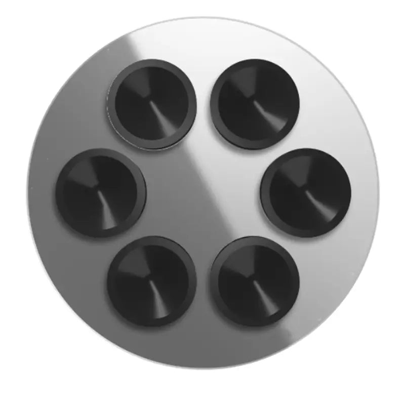 Une base métallique circulaire argentée avec six capuchons magnétiques coniques noirs et brillants pour le support de téléphone magnétique à ventouse pour iPhone Pro Max.