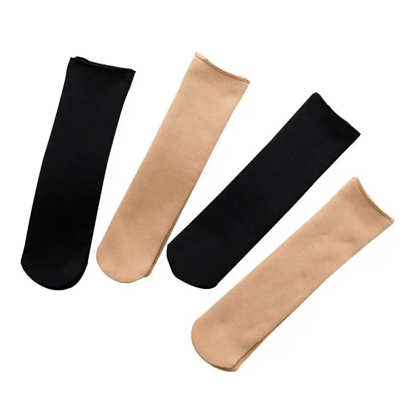 black and beige sheer tights made from smooth, stretchy fabric with a seamless design paired with winter thermal socks fleece lined with cashmere wool for warmth and comfort.