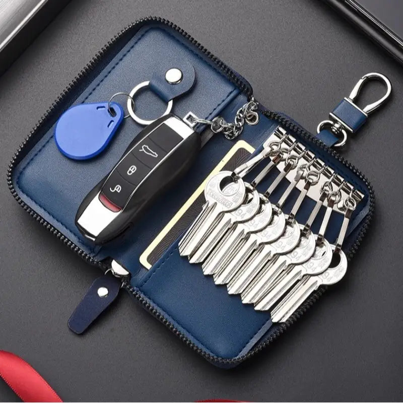 blue leather key holder organizer pouch holding a car key fob and multiple silver keys