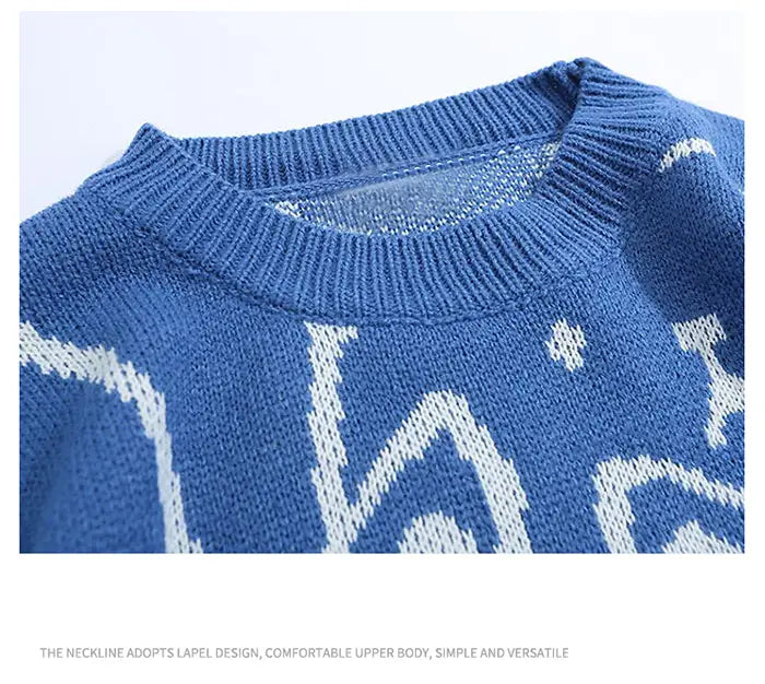 Pull ample en maille bleue à motif de chat de dessin animé Harajuku, avec motif abstrait blanc et encolure côtelée.