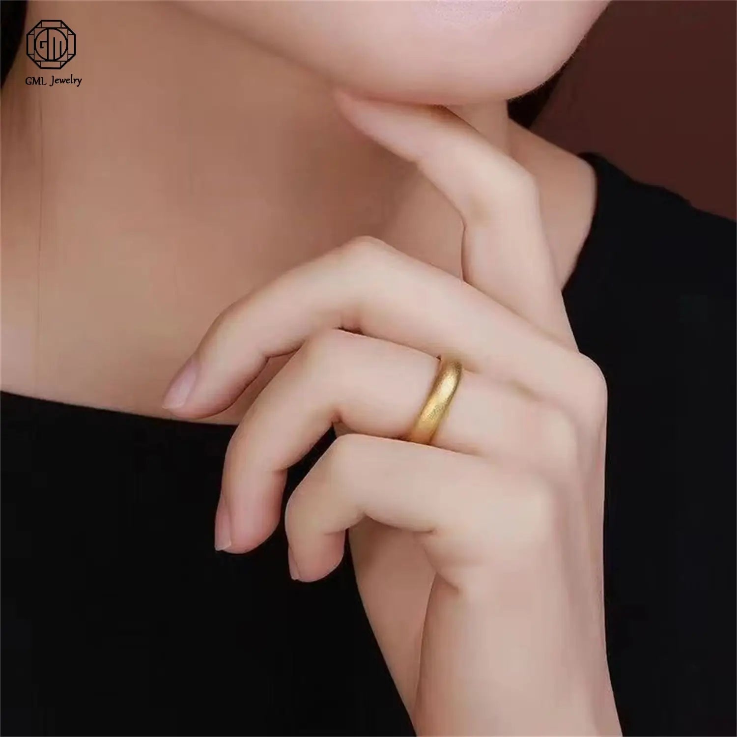 A sleek solid gold sand gold adjustable ring with a fade resistant matte finish and a wide band for unisex wear.