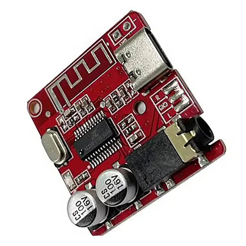 Red circuit board keychain pendant with usb port audio jack and electronic components designed in a cyberpunk led style.